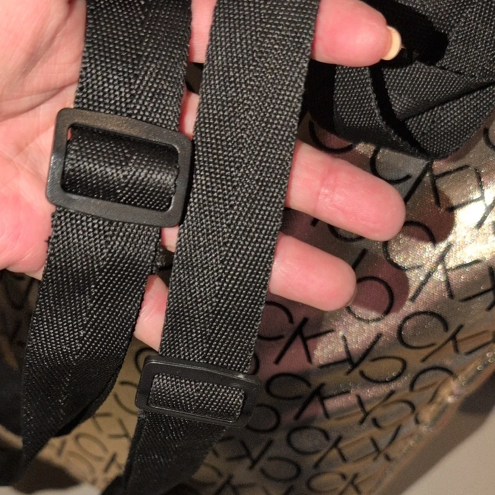 Calvin Klein Metallic Gold Backpack with Black Logo